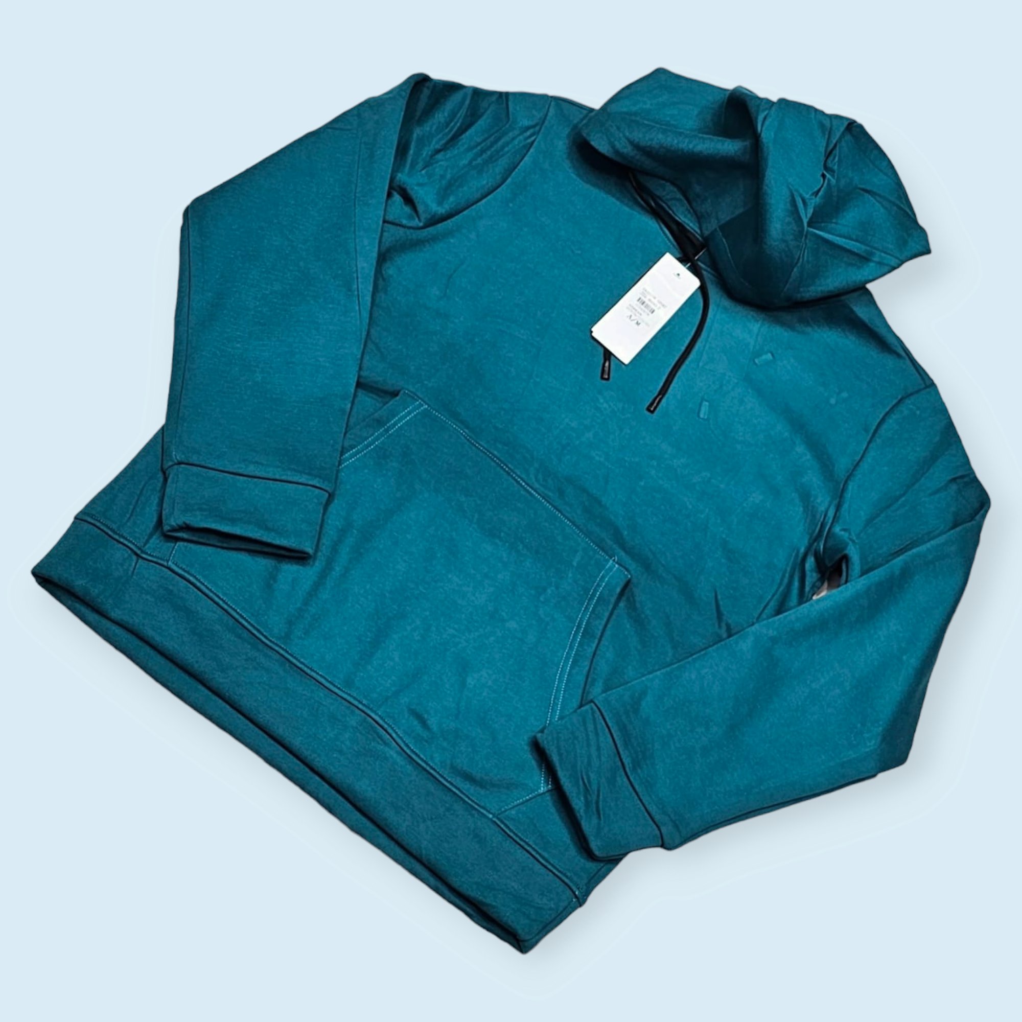 a blue pullover hoodie with drawstrings.