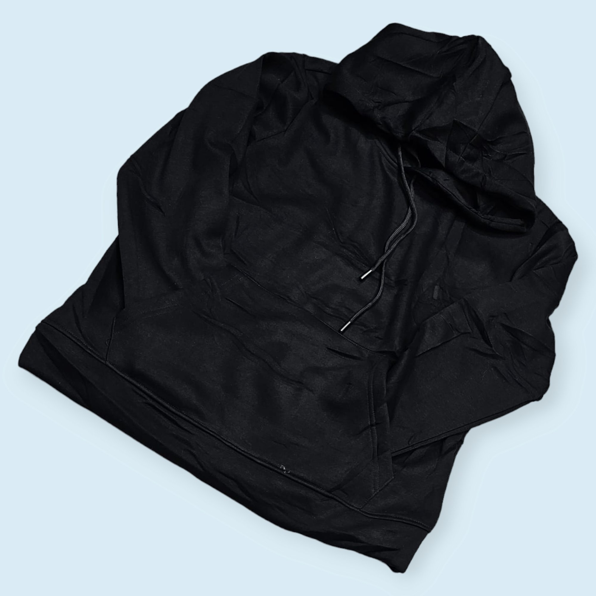 a black pullover hoodie with drawstrings.