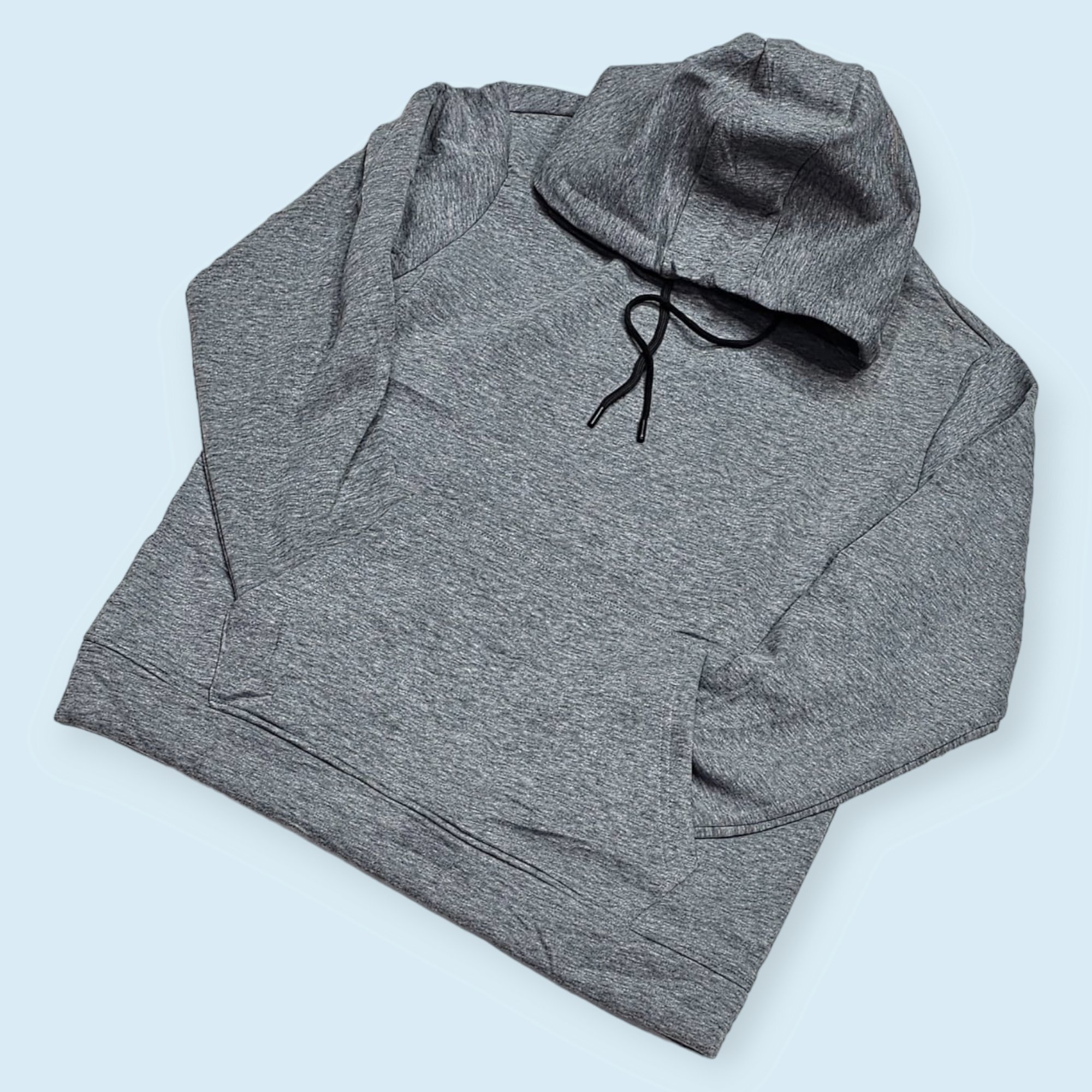 a dark gray pullover hoodie with drawstrings.