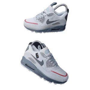 Pair of grey and white Air Max style sneakers with cushioned sole and breathable mesh upper, designed for everyday comfort and casual wear.
