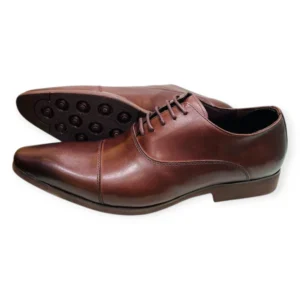 a pair of brown leather lace-up formal shoes with a rubber sole on the white background.