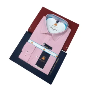 Men’s tailored fit pink formal dress shirt folded neatly, featuring a classic collar, buttoned cuffs, and premium cotton fabric for office and business wear.
