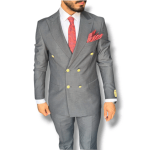 a gentleman wearing a grey double-breasted suit over a white shirt with a burgundy paisley tie and pocket square.