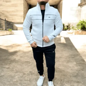Man wearing a premium men’s tracksuits with slim fit joggers and zip-up jacket, styled with white sneakers for casual and athletic wear