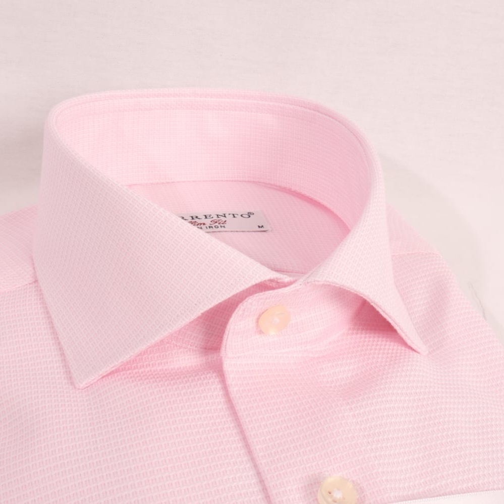 Folded pink Sorrento non-iron slim fit dress shirt with cutaway collar and wrinkle-free label, neatly displayed on a white background with brand tag visible.