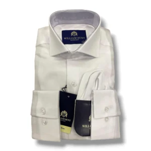 Men’s tailored fit white formal dress shirt folded neatly, featuring a classic collar, buttoned cuffs, and premium fabric for office and business wear.