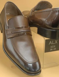 Pair of Pampa genuine leather brown loafers for men with leather sole and textured vamp, designed for formal and business wear.