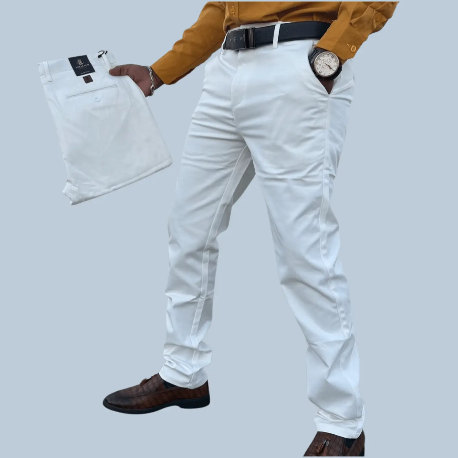 Man wearing soft white khaki slim fit trousers made from soft non-fade fabric, styled for smart casual, office, and everyday wear.