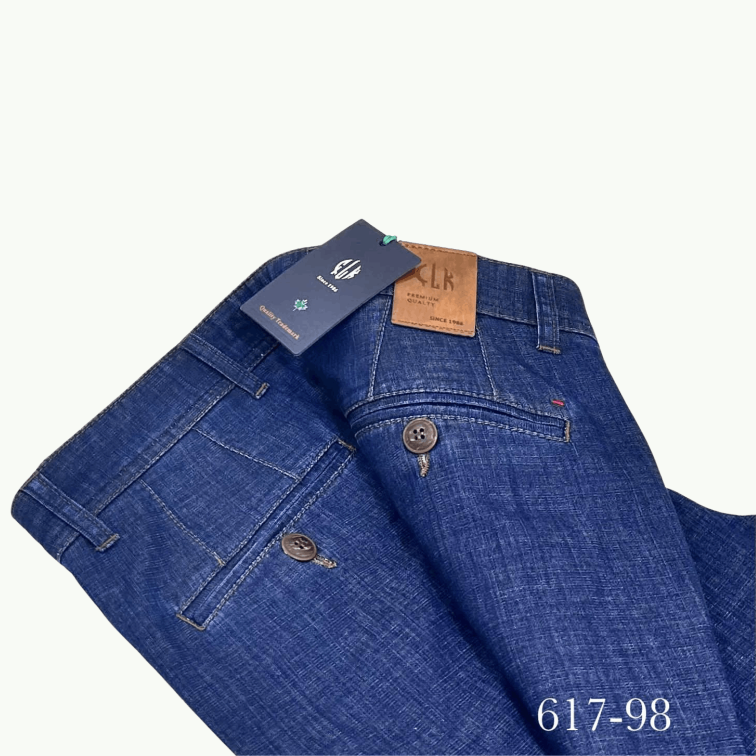 Men’s blue jeans folded flat, classic fit with 3% Lycra stretch, lightweight 200-gram summer fabric.